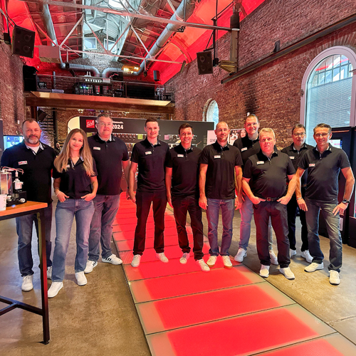 Gruppenfotos unserer Mitarbeiterinnen und Mitarbeiter auf dem SiDay 2024